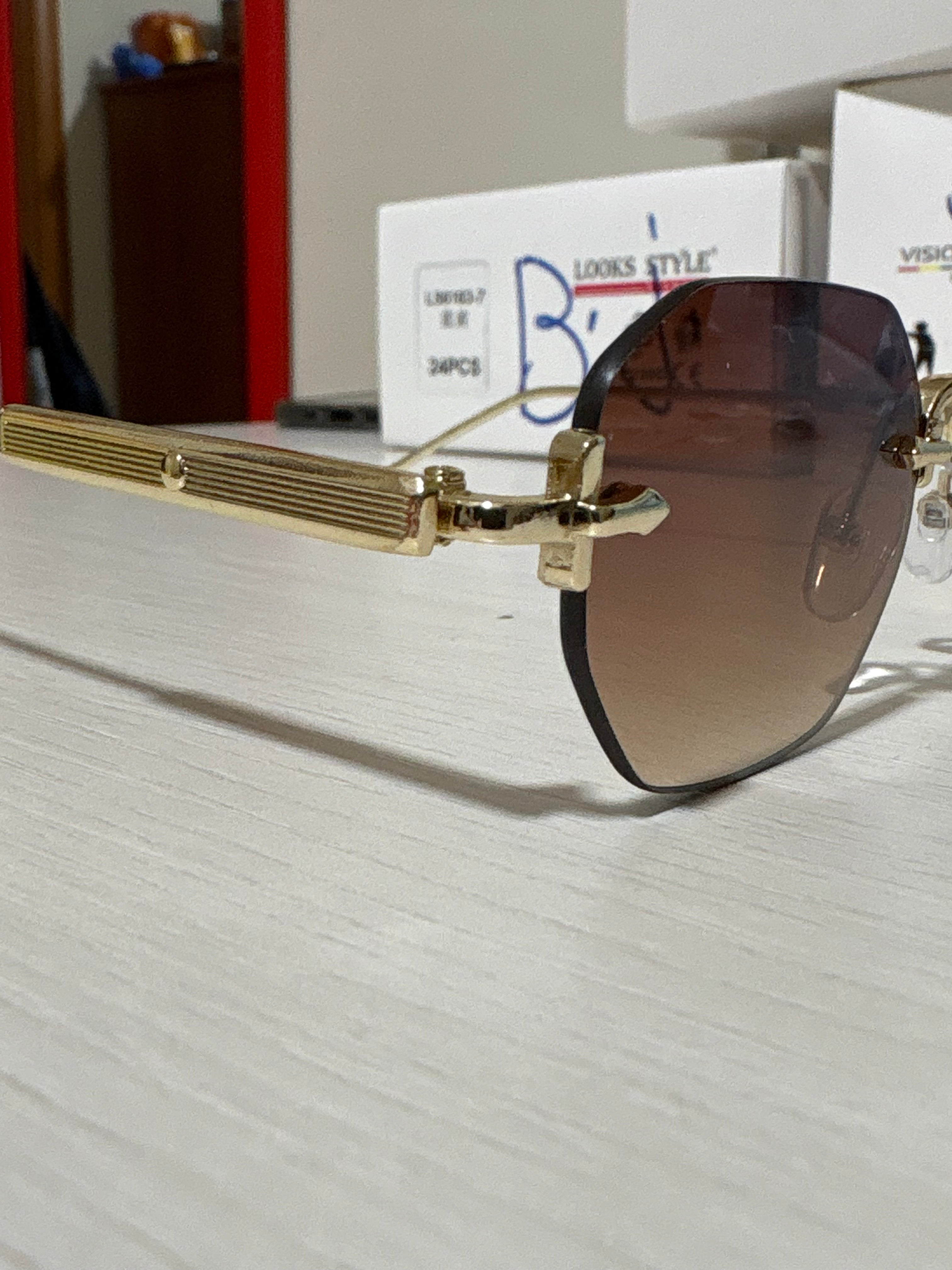 occhiali brown esagonal asta particolare